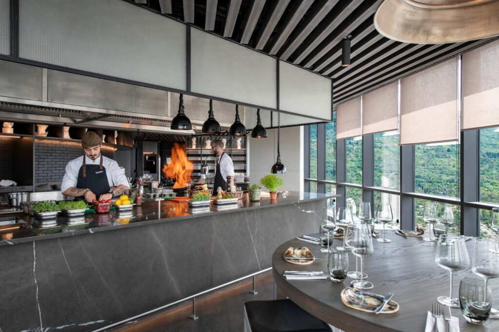 Chefs in the open kitchen at Dumas