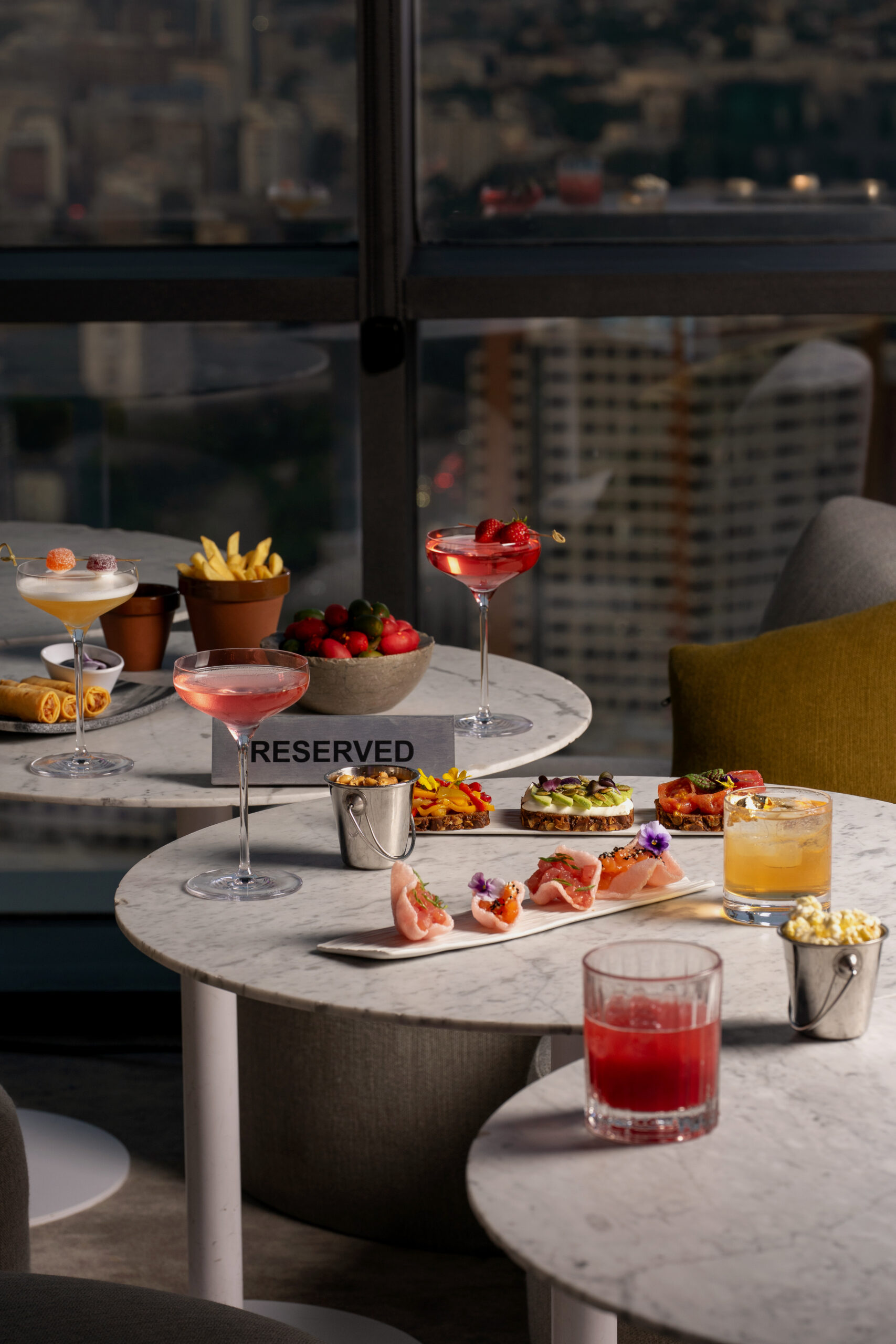 Cocktails on the terrace of Weather Report Sky Bar, 37th floor