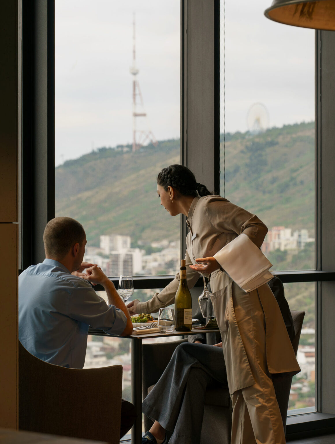 Guests dining at Dumas with a view over Tbilisi