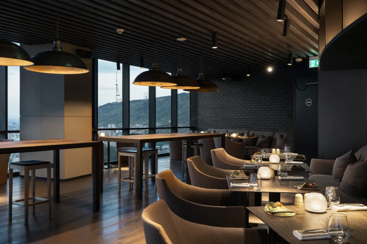 Dumas Restaurant dining room on the 36th floor, the hills through the windows