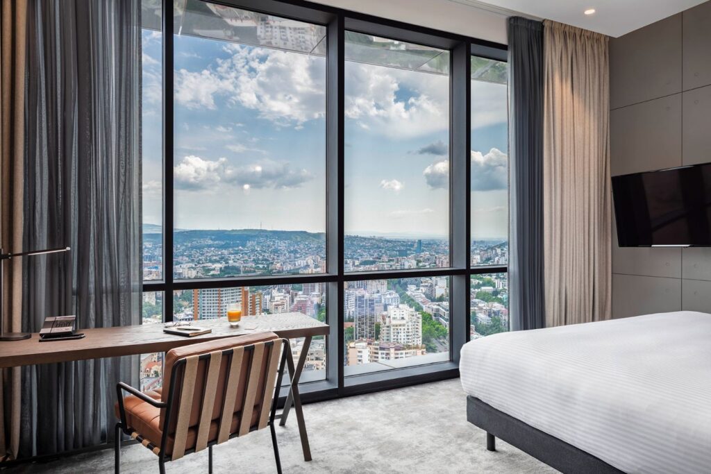 Executive Room desk by floor-to-ceiling windows, Pullman Tbilisi