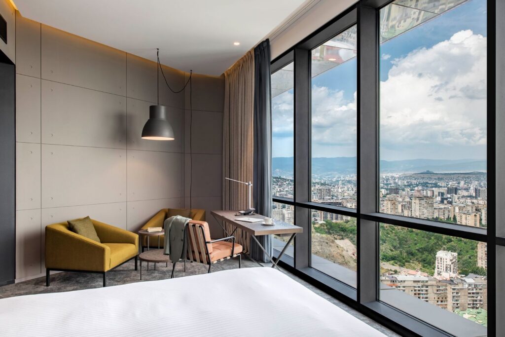 Executive Room with armchairs and city view, Pullman Tbilisi