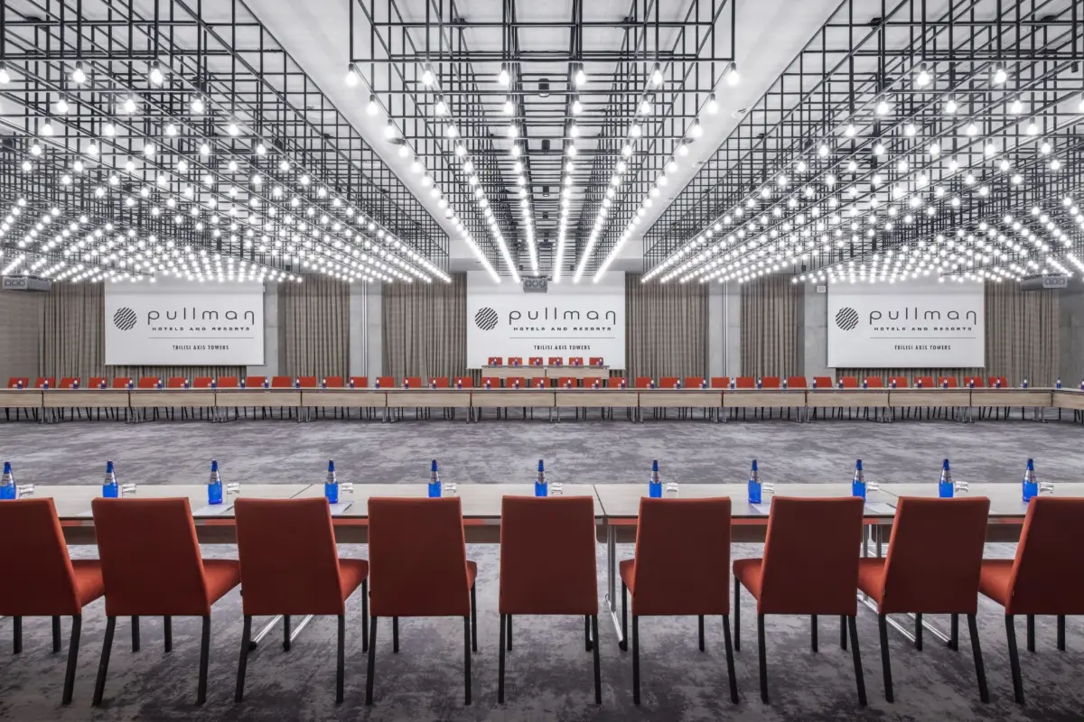 Grand Ballroom set for a conference, Pullman screens on the stage